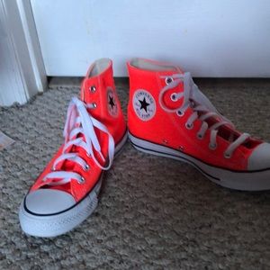 Neon orange converse. Size 7 for women, size 5 for men. Never been worn